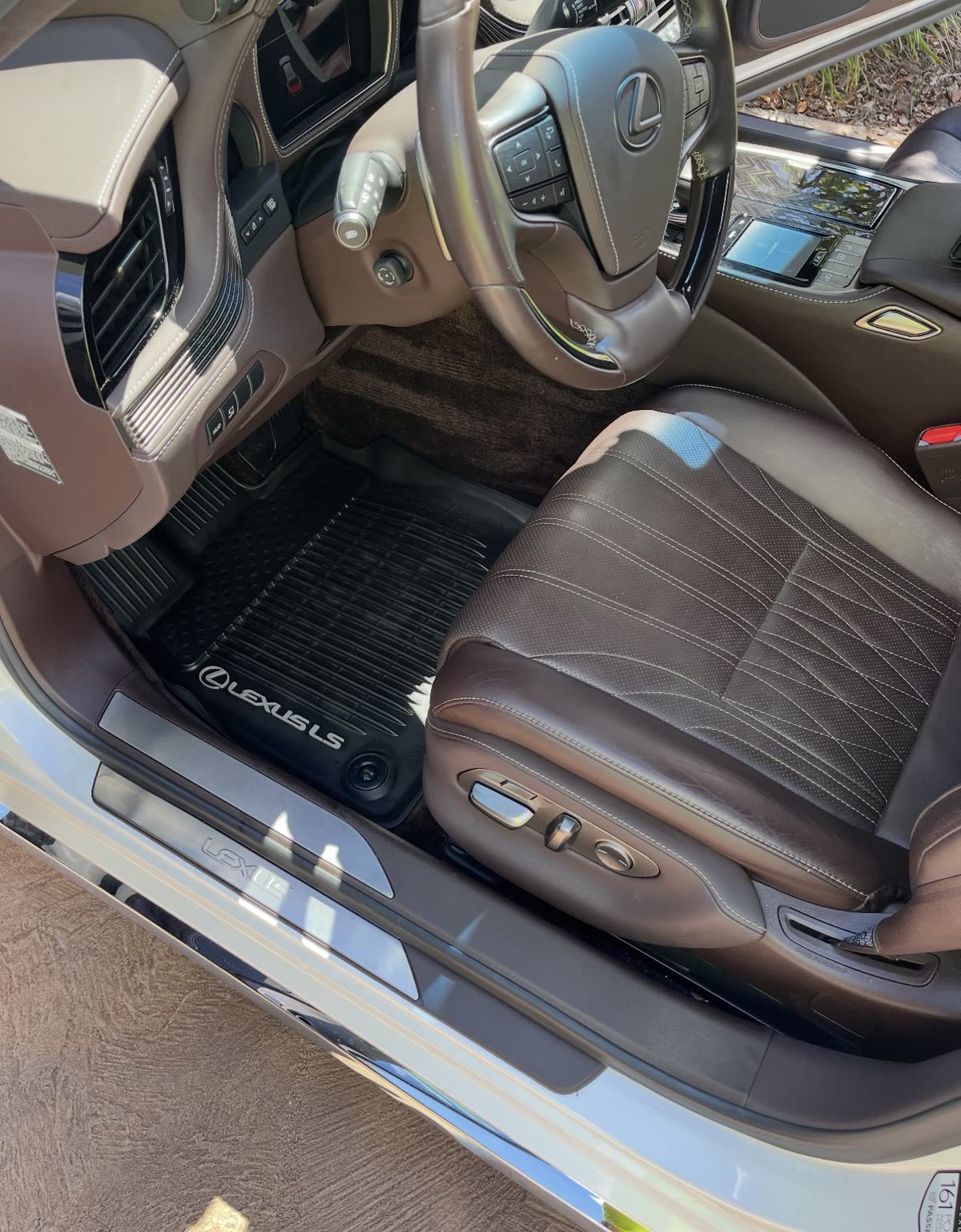 Detailed Lexus LS front cabin with clean leather and mats